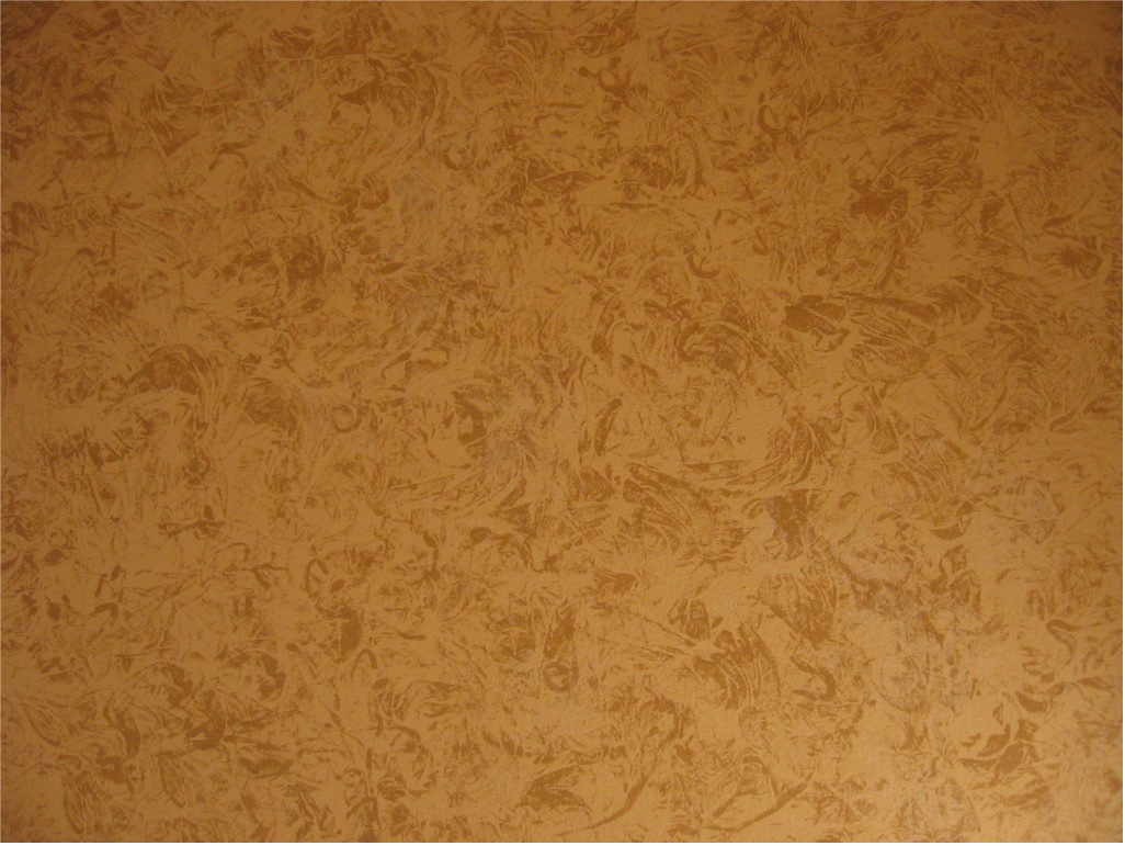 I'm a dark orange/ brown rag design faux finish over a light brown background.