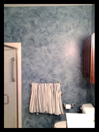 This is a bold wash faux finish with light gray
                over dark blue background.